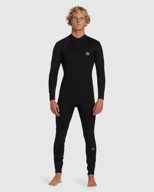 Image of a model wearing Tops. Productname: Billabong - Mens 4/3Mm Foil Back Zip Steamer Wetsuit - Black - in Black colour by brand - Billabong