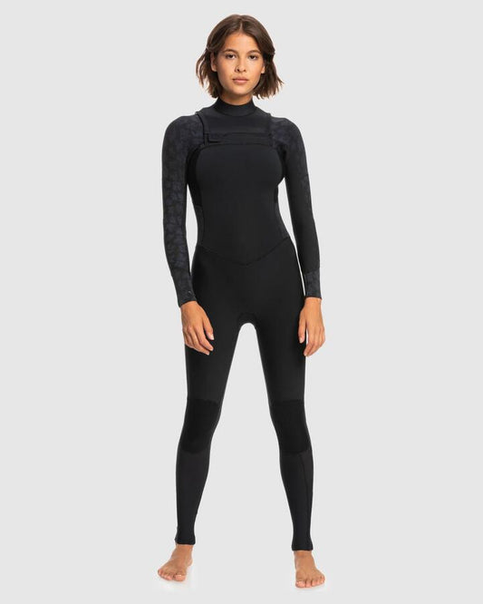 Image of a model wearing Tops. Productname: Roxy - Womens 3/2Mm Swell Series Gbs Chest Zip Wetsuit - Black - in Black colour by brand - Roxy