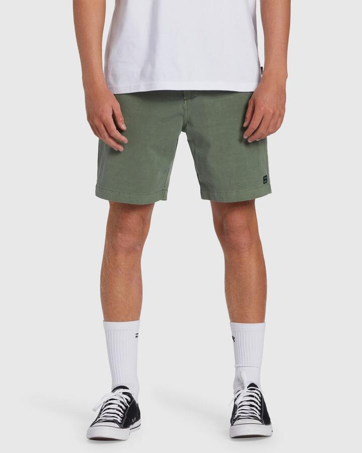Image of a model wearing Shorts. Product name - Billabong Mens Crossfire Wave Washed 18" Hybrid Shorts Sage - in Sage colour by brand - Billabong