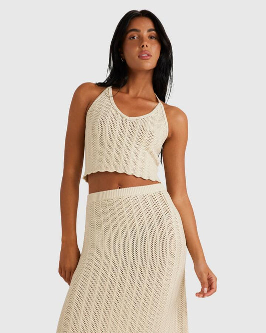 Image of a model wearing Tops. Productname: RVCA Womens Crochet Halter Tank Top Natural - in Natural colour by brand - RVCA