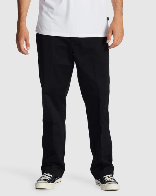 Image of a model wearing Pants. Productname: Billabong Mens Carter Chino Pants Black - in Black colour by brand - Billabong