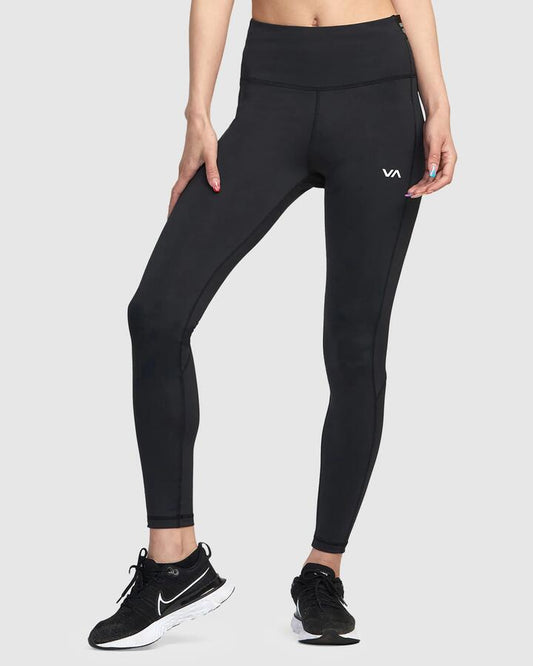 Image of a model wearing Pants. Productname: RVCA Womens Compression Legging Black - in Black colour by brand - RVCA