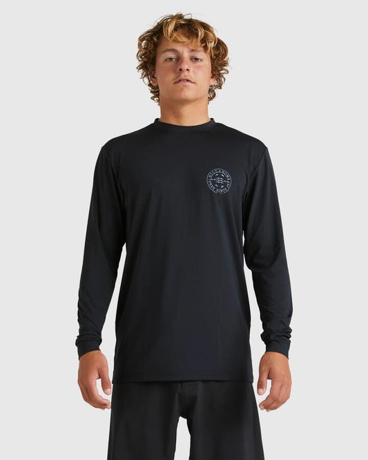 Image of a model wearing Tops. Productname: Billabong Mens Big Wave Daz Long Sleeve Rash Vest Black - in Black colour by brand - Billabong