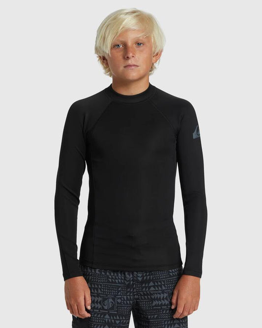 Image of a model wearing Tops. Productname: Quiksilver Boys 2-7 Everyday Heat Long Sleeve Upf 50 Rash Vest Black - in Black colour by brand - Quiksilver