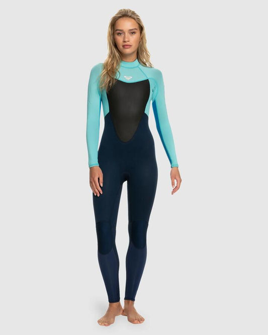 Image of a model wearing Tops. Productname: Roxy Womens 3/2Mm Prologue Flatlock Back Zip Wetsuit Good Mood - in Good Mood colour by brand - Roxy