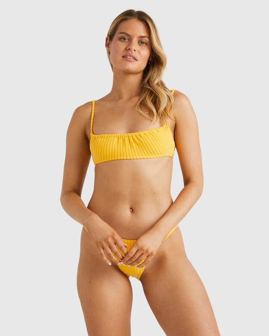 Image of a model wearing Tops. Productname: Billabong - Womens Terry Rib Mila Bralette Bikini Top - Banana - in Banana colour by brand - Billabong