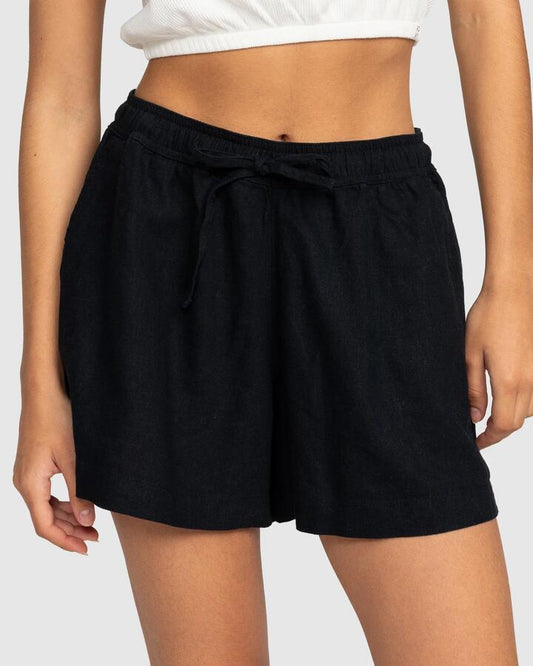 Image of a model wearing Shorts. Productname: Roxy - Womens Lekeitio Break Mid Beach Shorts - Anthracite - in Anthracite colour by brand - Roxy