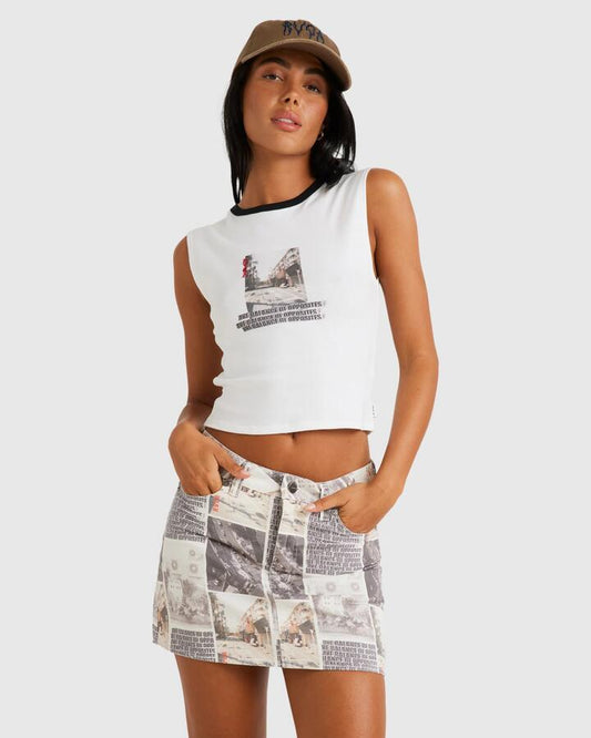 Image of a model wearing Skirts. Productname: RVCA - Womens Kyoto Mid Rise Mini Skirt - Whisper White - in Whisper White colour by brand - RVCA