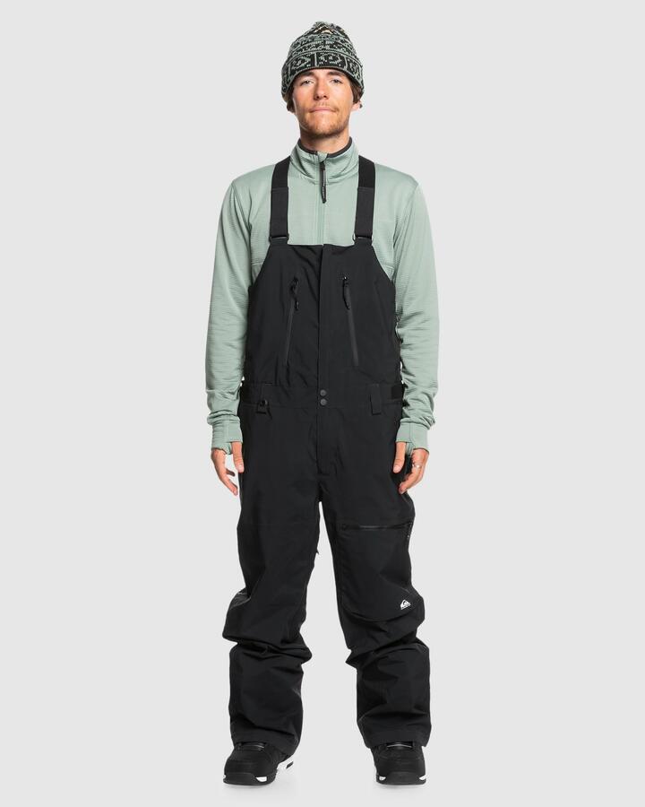 Image of a model wearing Pants. Product name - Quiksilver Mens Altostratus Gore-Tex Bib Snow Pants True Black in True Black colour by brand - Quiksilver