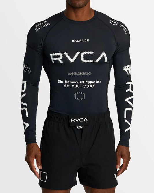 Image of a model wearing Tops. Productname: RVCA - Mens Sport Long Sleeve Rash Vest - Black All Brand 2 - in Black All Brand 2 colour by brand - RVCA