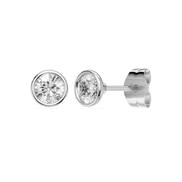 Image of Earrings. Productname: Bezel Stud Earrings with 0.80tw of Laboratory-Grown Diamonds in Sterling Silver and Platinum in Diamond colour by brand - Bevilles