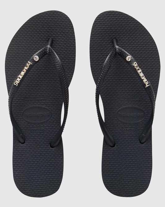 Image of Sandals. Productname: Havaianas Womens Slim Metal Logo Crystal Thongs Preto - in Preto colour by brand - Havaianas