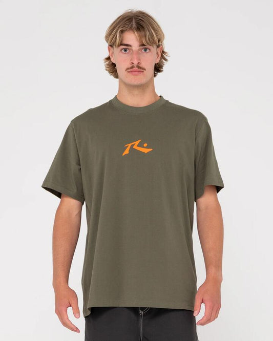 Image of a model wearing Tops. Productname: Rusty Mens One Hit Cf Competition Short Sleeve T-Shirt Savanna - in Savanna colour by brand - Rusty