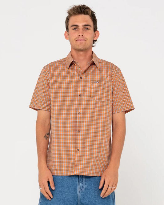 Image of a model wearing Tops. Productname: Rusty Mens Datsun Check Short Sleeve Shirt Persimmon Orange - in Persimmon Orange colour by brand - Rusty