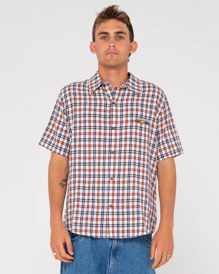 Image of a model wearing Tops. Productname: Rusty Mens Beama Curved Hem Short Sleeve Shirt White / Navy - in White / Navy colour by brand - Rusty