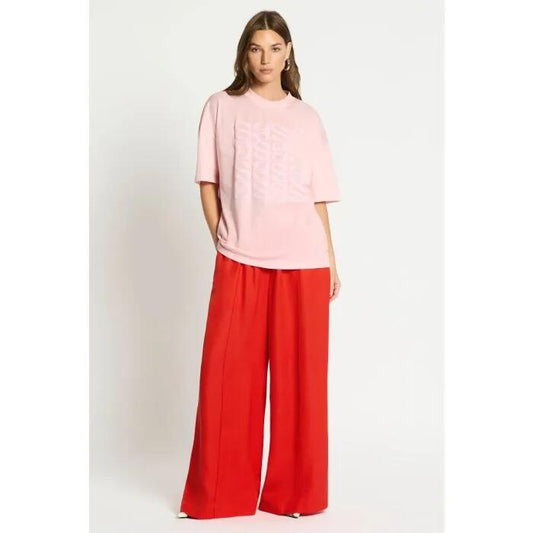 Image of a model wearing Tops. Productname: Ludovica Tee in BALLERINA colour by brand - sass and bide