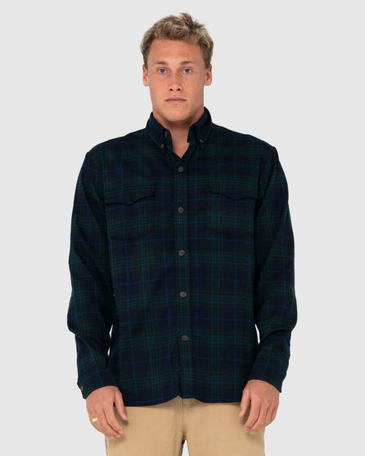 Image of a model wearing Tops. Productname: Rusty Mens Black Watch Long Sleeve Shirt Navy Blue - in Navy Blue colour by brand - Rusty