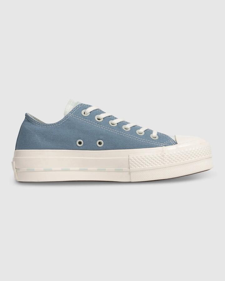 Image of Sneakers. Productname: Converse Womens Chuck Taylor All Star Lift Sneakers Indigo Oxide/Light S - in Indigo Oxide/Light S colour by brand - Converse