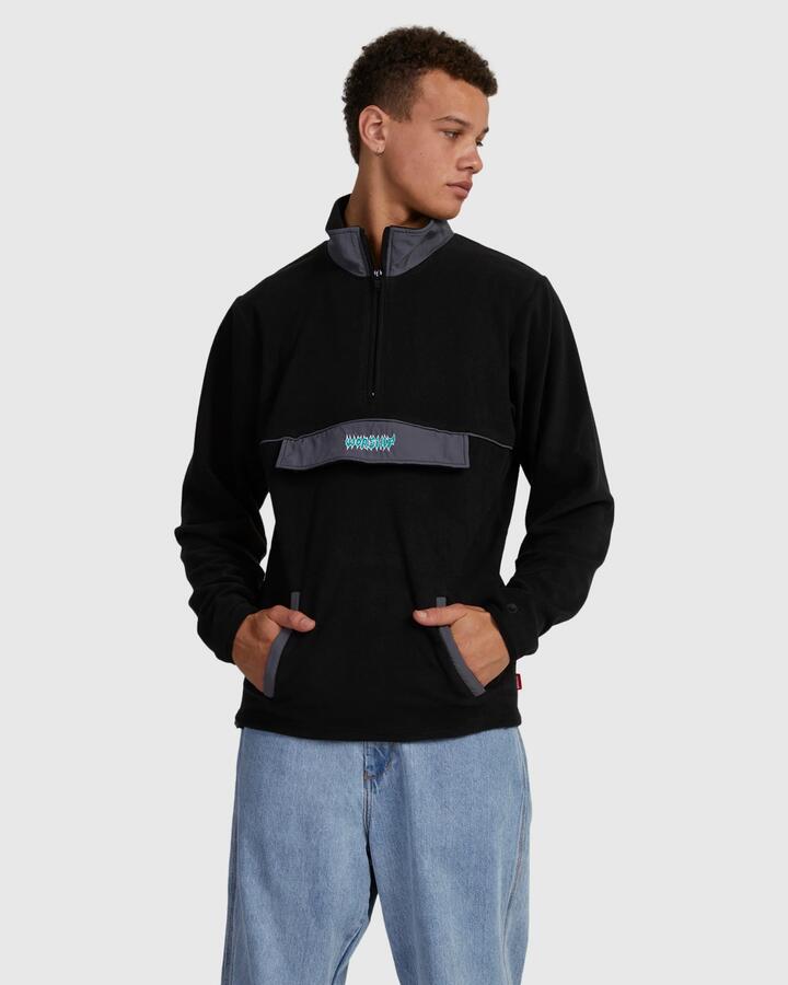 Image of a model wearing Outerwear. Product name - Worship Mens Thunderstruck Quarter Zip Fleece Jumper Black in Black colour by brand - Worship