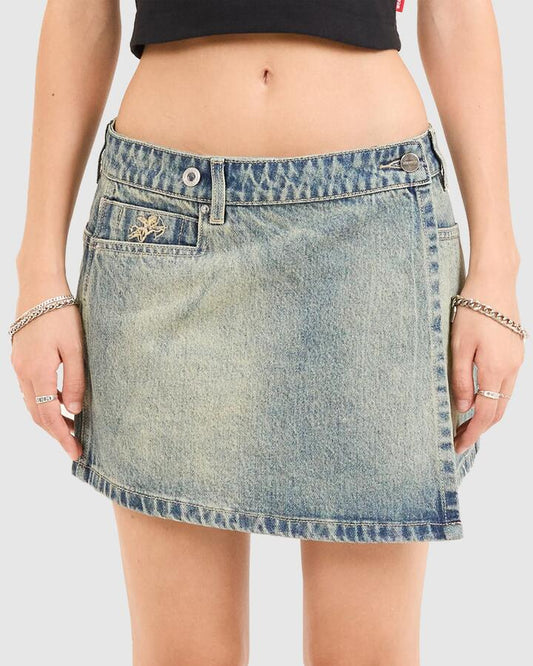 Image of a model wearing Skirts. Productname: Worship Womens Vexed Denim Mini Skirt Blue - in Blue colour by brand - Worship