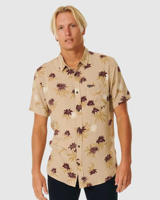 Image of a model wearing Tops. Productname: Rip Curl Mens Razed Floral Short Sleeve Shirt Taupe - in Taupe colour by brand - Rip Curl