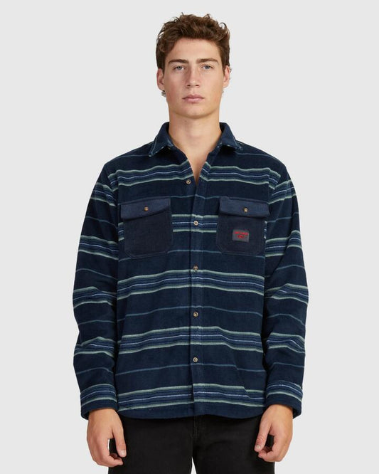 Image of a model wearing Tops. Productname: Rip Curl Mens Polar Fleece Party Pack Long Sleeve Shirt Dark Navy - in Dark Navy colour by brand - Rip Curl