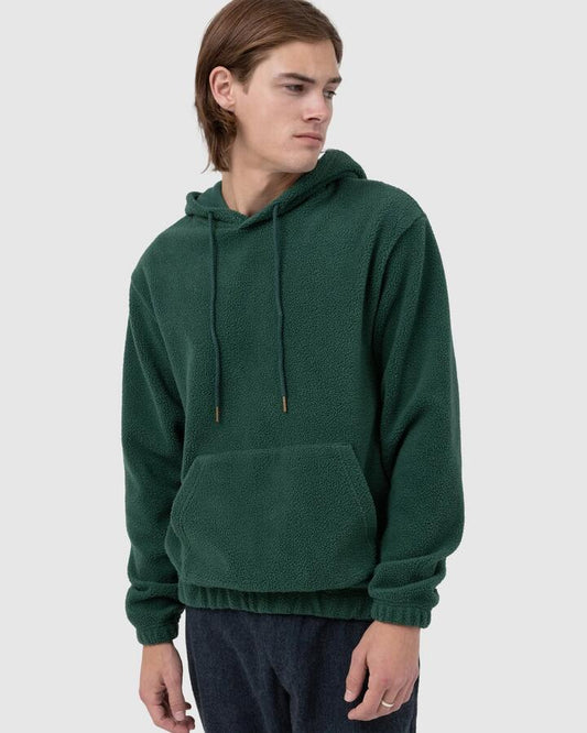 Image of a model wearing Outerwear. Productname: Rhythm Mens Reverse Fleece Hoodie Kelp - in Kelp colour by brand - Rhythm