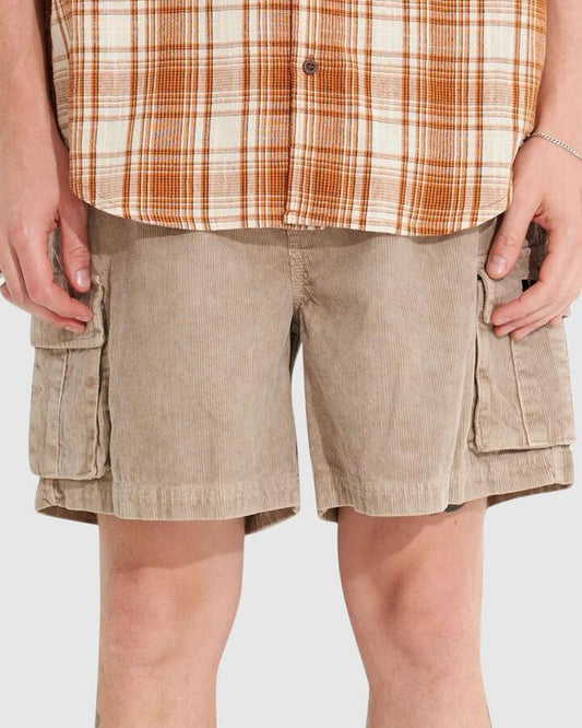 Image of a model wearing Shorts. Productname: Misfit Mens Devod Cord Cargo Short Pigment Mushroom - in Pigment Mushroom colour by brand - Misfit
