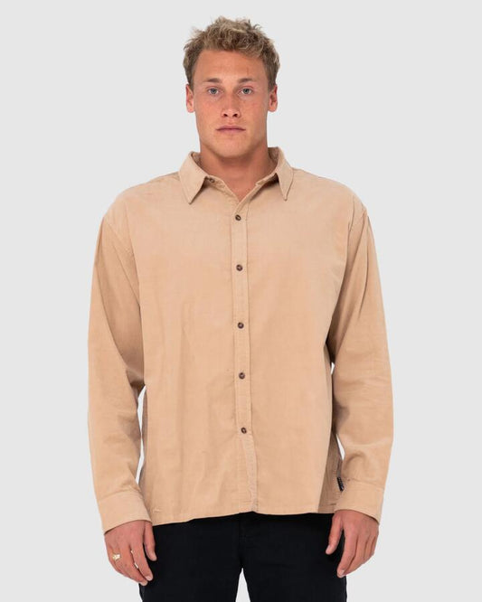 Image of a model wearing Tops. Productname: Rusty Mens Micro Lite Cord Long Sleeve Shirt Light Khaki - in Light Khaki colour by brand - Rusty