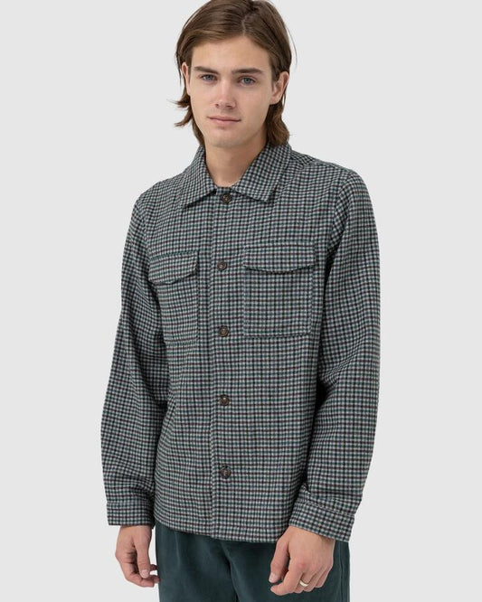 Image of a model wearing Tops. Productname: Rhythm - Mens Check Long Sleeve Shirt - Pacific - in Pacific colour by brand - Rhythm