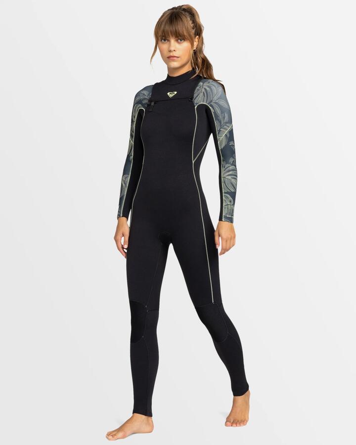 Image of a model wearing Tops. Productname: Roxy - Womens 3/2Mm Elite Gbs Chest Zip Wetsuit - Anthracite The Palms Wetsuit - in Anthracite The Palms Wetsuit colour by brand - Roxy