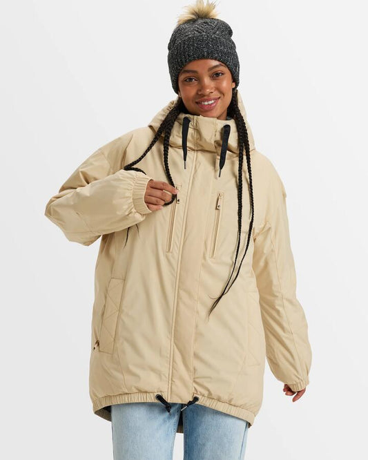 Image of a model wearing Outerwear. Productname: Roxy - Womens Lofty Cloud Insulated Jacket - Pebble - in Pebble colour by brand - Roxy