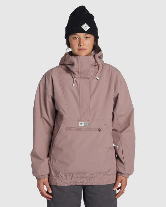 Image of a model wearing Outerwear. Productname: DC Shoes Womens Chalet Anorak Snow Jacket Twilight Mauve - in Twilight Mauve colour by brand - DC Shoes