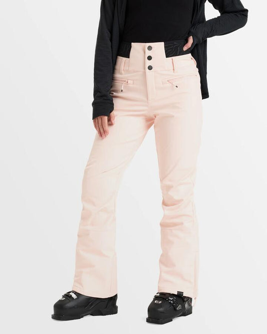 Image of a model wearing Pants. Productname: Roxy Womens Rising High Snow Pants Pink Salt - in Pink Salt colour by brand - Roxy