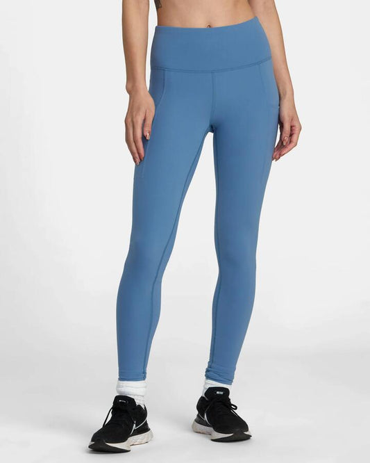 Image of a model wearing Pants. Productname: RVCA - Womens Va Essential Pocket Legging Ii - Coronet Blue - in Coronet Blue colour by brand - RVCA
