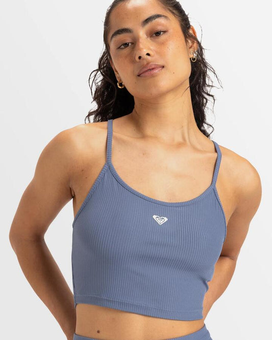 Image of a model wearing Tops. Productname: Roxy - Womens Rise & Vibe Sports Tank Top - Wild Wind - in Wild Wind colour by brand - Roxy