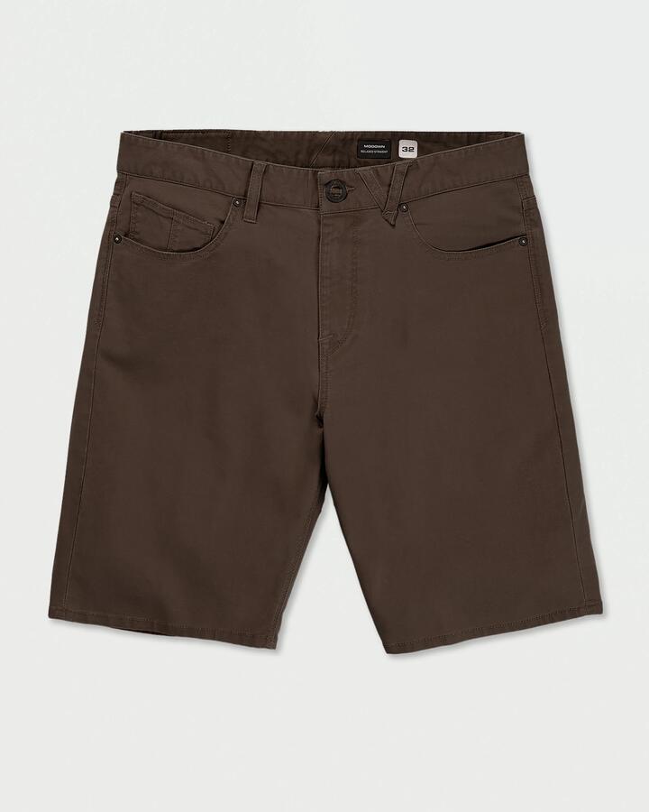 Image of a model wearing Shorts. Productname: Volcom Mens Modown Canvas 5 Pocket Walk Shorts Wren - in Wren colour by brand - Volcom