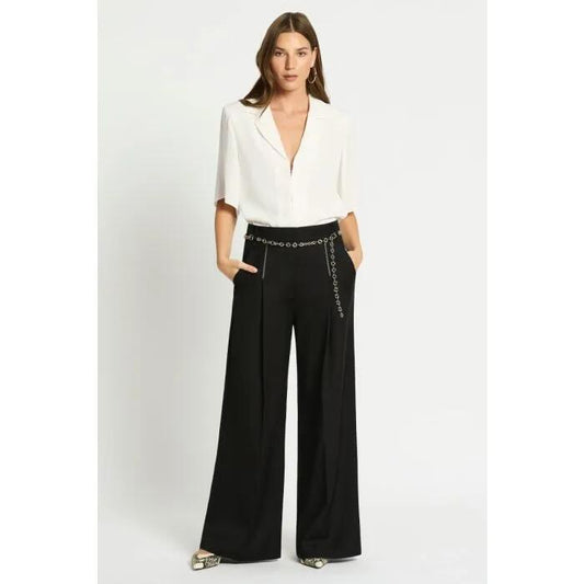 Image of a model wearing Pants. Productname: Atomic Pant in Black colour by brand - sass and bide