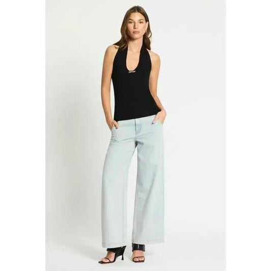 Image of a model wearing Tops. Productname: Modi Halter Neck Knit Top in NOIR colour by brand - sass and bide