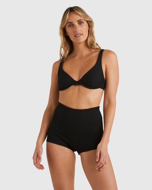 Image of a model wearing Shorts. Productname: Billabong Womens Tanlines Surf Shorts Bikini Bottom Black - in Black colour by brand - Billabong