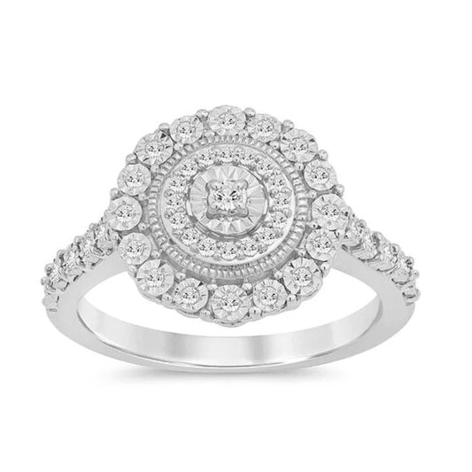 Image of Jewelry. Productname: Round Halo Ring with 0.15ct of Diamonds in Sterling Silver in Diamond colour by brand - Bevilles