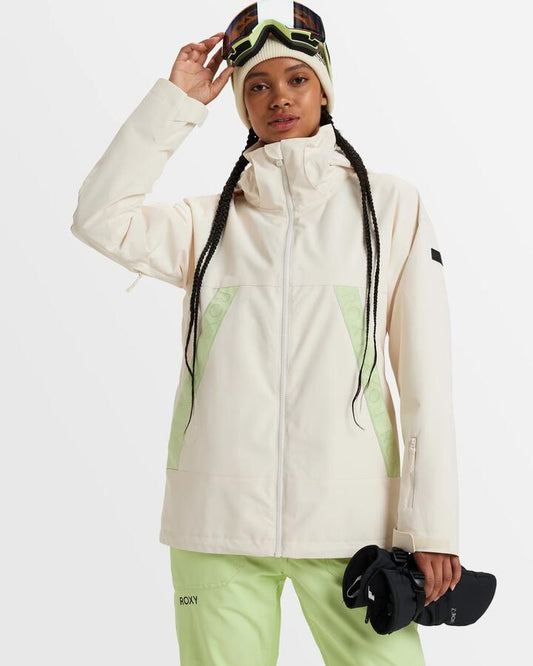 Image of a model wearing Outerwear. Productname: Roxy - Womens Roxy Slope Snow Jacket - Buttercream - in Buttercream colour by brand - Roxy