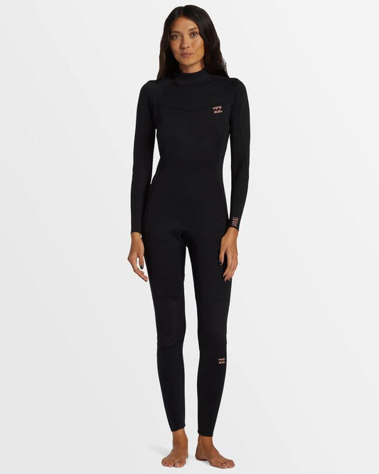 Image of a model wearing Tops. Productname: Billabong Womens 3/2Mm Foil Back Zip Steamer Wetsuit Black - in Black colour by brand - Billabong