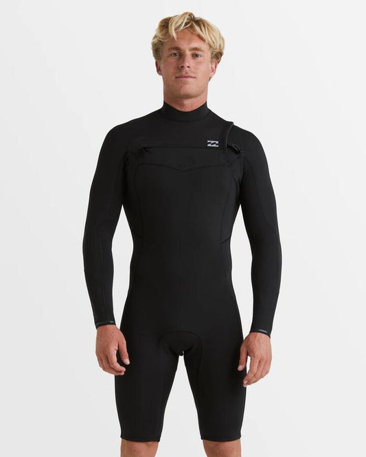 Image of a model wearing Tops. Productname: Billabong - Mens 2/2Mm Revolution Natural Chest Zip Long Sleeve Springsuit - Black - in Black colour by brand - Billabong