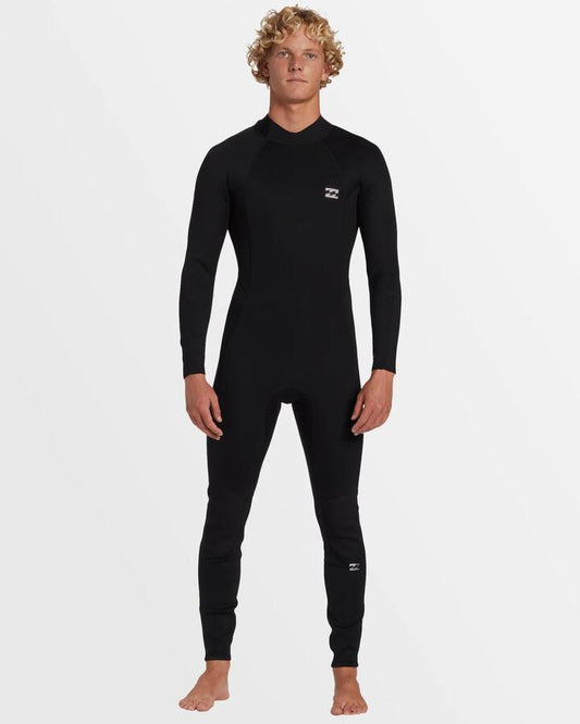 Image of a model wearing Tops. Productname: Billabong Mens 3/2Mm Foil Back Zip Gbs Steamer Wetsuit Black - in Black colour by brand - Billabong
