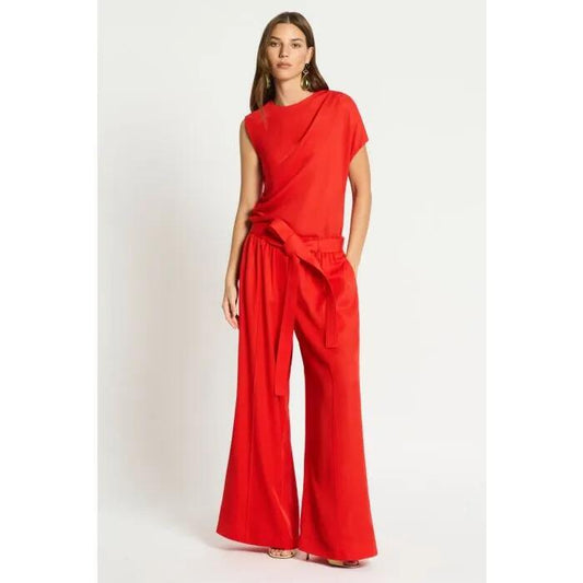 Image of a model wearing Pants. Productname: Pandemonium Pant in GARNET RED colour by brand - sass and bide