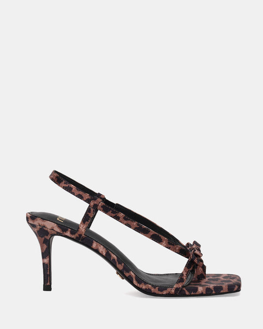 Image of Sandals. Product name - Udane Women's Strappy Low Heel Leopard Novo Sandals in Leopard colour by brand - NOVO