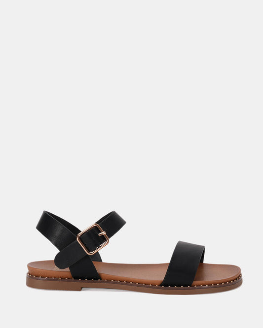 Image of Sandals. Product name - Trainor Women's Strappy Flat BLACK Novo Sandals in Black colour by brand - NOVO