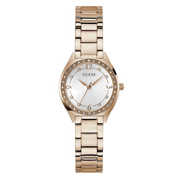 Image of a model wearing Dress. Productname: Guess Dress Charlotte Dress Rose Gold-Tone Crystal Bezel Women's Watch GW0767L3 in Watch colour by brand - Guess