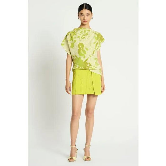 Image of a model wearing Skirts. Productname: Kyss Mini Skirt in DARK PEAR colour by brand - sass and bide